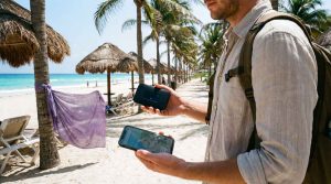 Tourist comparing pocket wifi router and smartphone for internet in Mexico