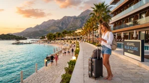 Traveler using mobile internet with an Albania eSIM on the Albanian Riviera.