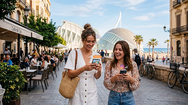 Tourists using mobile internet and eSIM in Valencia