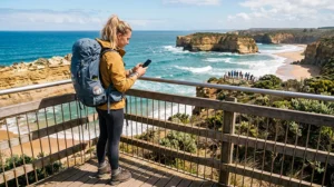 Backpacker using an eSIM while traveling across Australia