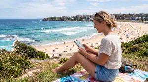 Tourist using an eSIM at Bondi Beach while exploring Sydney Australia