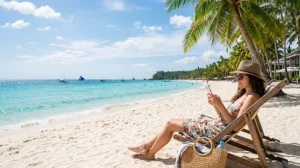 Traveler using a Philippines eSIM while enjoying White Beach in Boracay