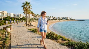 Traveler using an eSIM for mobile internet while visiting İskele in North Cyprus