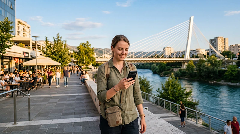 Traveler using an eSIM while exploring Podgorica in Montenegro