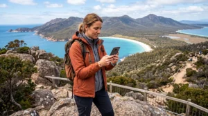 Traveler using an eSIM while exploring Tasmania Australia during a road trip