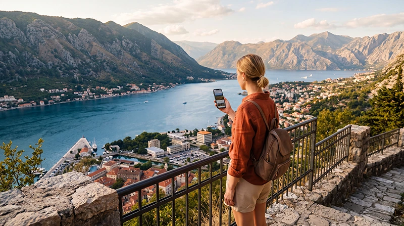 Traveler using fast mobile data while exploring Montenegro