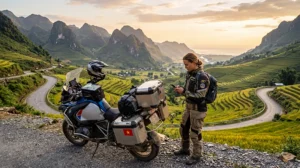 Motorbike traveler using mobile internet while exploring Vietnam