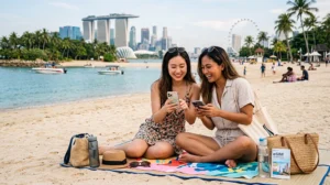 Tourist using mobile internet during Singapore vacation with eSIM for maps, Grab, MRT and travel apps