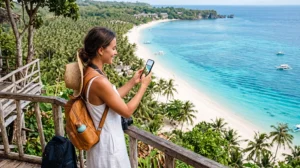 Tourist using mobile internet while exploring Siquijor Island in the Philippines