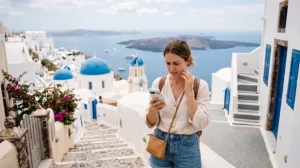 Traveler fixing no internet on a Greece eSIM while visiting the Greek islands