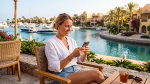 Tourist using an eSIM for mobile internet while visiting El Gouna Egypt