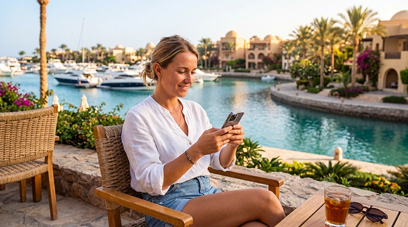 Tourist using an eSIM for mobile internet while visiting El Gouna Egypt