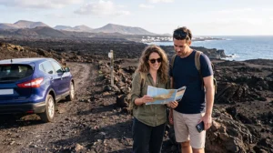 Travellers using an eSIM while exploring Lanzarote volcanic landscapes