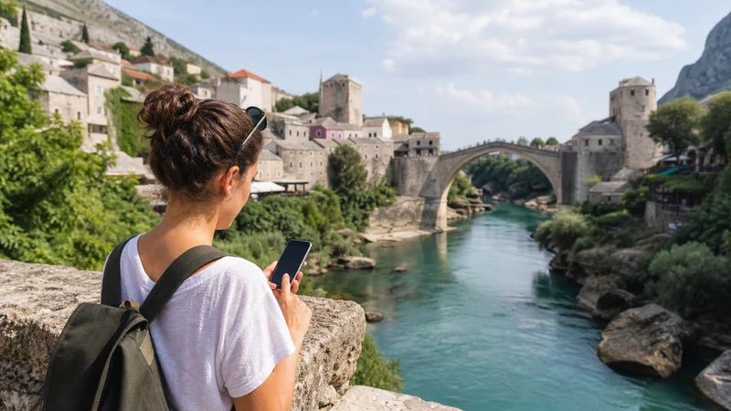 Traveller using a smartphone during bosnia and herzegovina esim on android in Bosnia and Herzegovina.