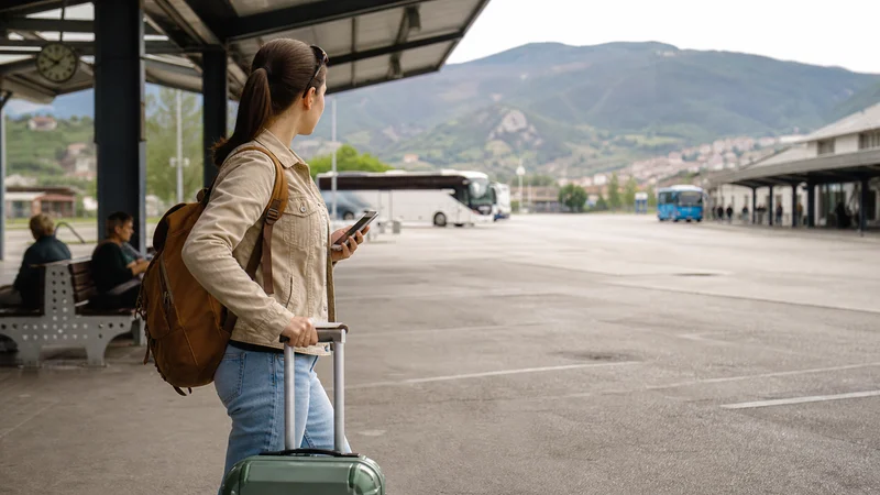 Traveller using a smartphone during bosnia and herzegovina esim for multi-city travel in Bosnia and Herzegovina.