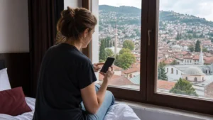 Traveller using a smartphone during bosnia and herzegovina esim on iphone in Bosnia and Herzegovina.
