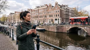 Traveller using Google Maps for navigation during a trip through the Netherlands