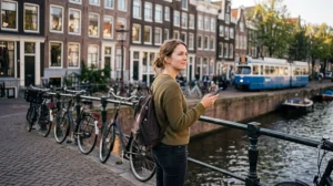 Traveller installing a Netherlands travel eSIM on a compatible smartphone before departure