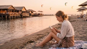 Traveler using mobile internet while visiting Ada Bojana in Montenegro
