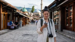 Traveller using a smartphone during internet in bosnia and herzegovina for tourists in Bosnia and Herzegovina.