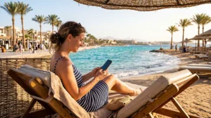 Tourist using mobile internet while visiting Hurghada Egypt