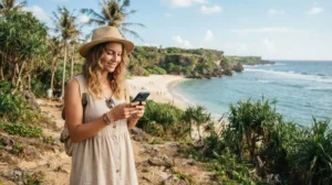 Tourist using mobile internet while visiting Kenting National Park in Taiwan