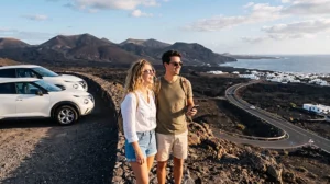 Tourists using mobile internet while exploring Lanzarote by car