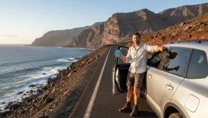 Traveller using mobile data on smartphone during a Canary Islands road trip