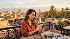 Tourist using mobile internet while traveling in Morocco