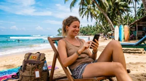 Traveler using unlimited mobile data on a beach in Sri Lanka