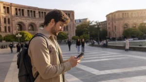 Traveller checking a modern smartphone in central Yerevan