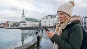 Traveller using a smartphone in Iceland