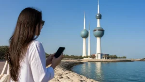 Traveller using a smartphone in a Kuwait setting related to using 5g in kuwait as a visitor