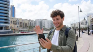 Traveller using a smartphone in Malta while using 5G in Malta