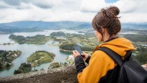 Traveller using a smartphone in Colombia for when to activate your colombia esim