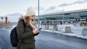 Traveller using a smartphone in Iceland