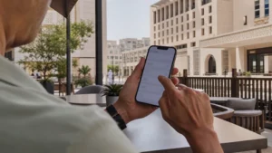 Traveller using a smartphone in Qatar for qatar esim apn settings: iphone and android