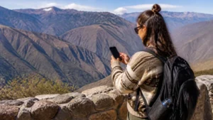 Traveller using a smartphone in Peru for arequipa colca canyon mobile internet