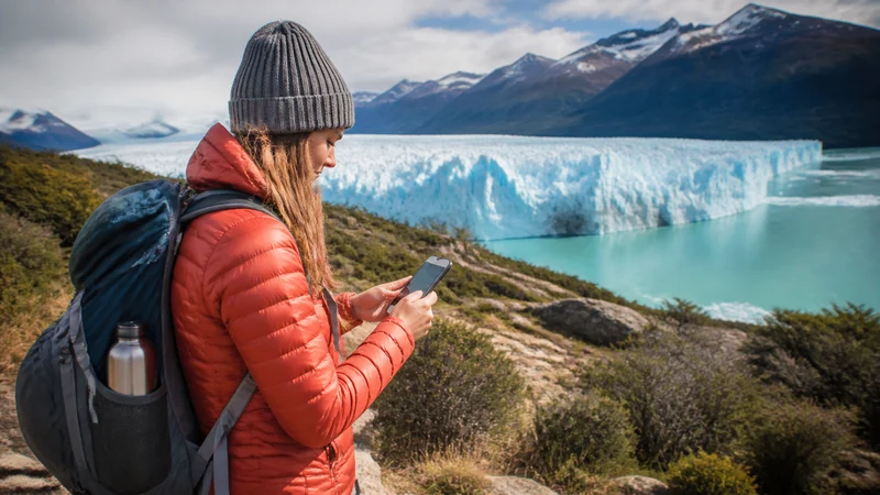 Traveller using a smartphone in Argentina for mobile internet for photographing argentina