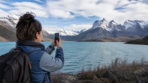 Traveller using a smartphone in Argentina for how to prepare your phone for an argentina road trip