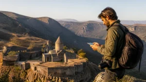 Traveller using a smartphone while using internet for a photography trip in Armenia