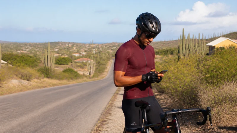 Traveller checking mobile reception in rural Aruba