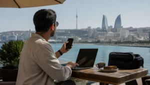 Traveller sharing phone data with a laptop in Baku