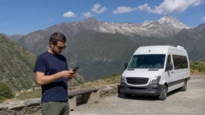 Traveller checking mobile data near the Azerbaijan Georgia border