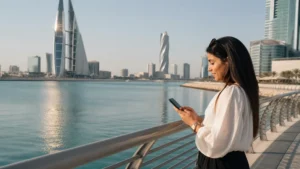 Traveller using a smartphone in Bahrain for bahrain bay mobile internet