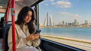 Traveller using a smartphone in Bahrain for bahrain bus travel internet