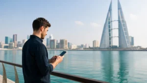 Traveller using a smartphone in Bahrain for bahrain esim iphone