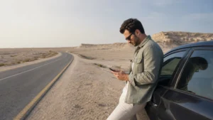 Traveller using a smartphone in Bahrain for bahrain road trip mobile internet