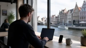 Traveller working with a laptop and smartphone in Belgium