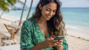 Traveller using a smartphone in Mauritius while researching mobile internet in belle mare